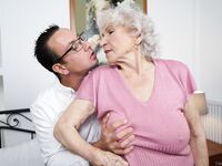 Busty Granny Shagged By Young Male Helper photos (Norma B)