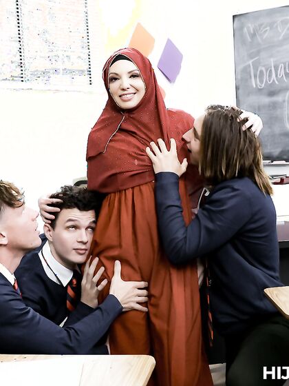 Slutty Arab Teacher In Hijab Gets Properly Fucked By Her Students photos (Kiki Daire)