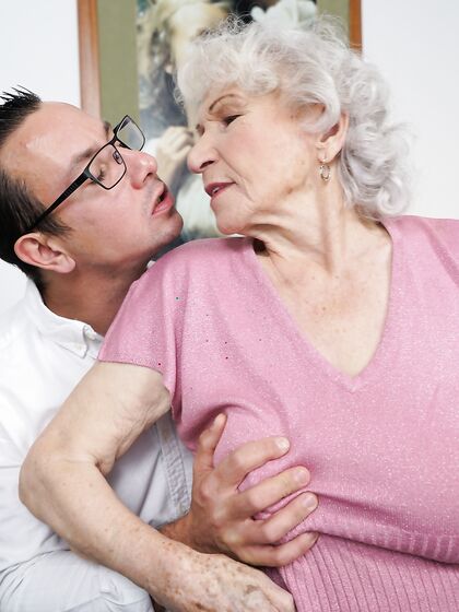 Busty Granny Shagged By Young Male Helper photos (Norma B)