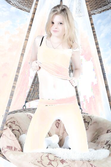 Blonde Teen Kisa A Sexily Looks At You When Taking Off Cloth By Cloths And Posing Naked
