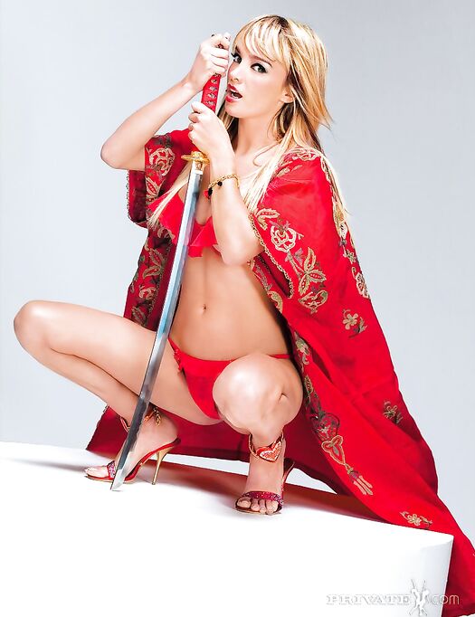Blonde Virginie Caprice Takes Off Her Red Outfit And Gets Double Stuffed By Two Horny Knights